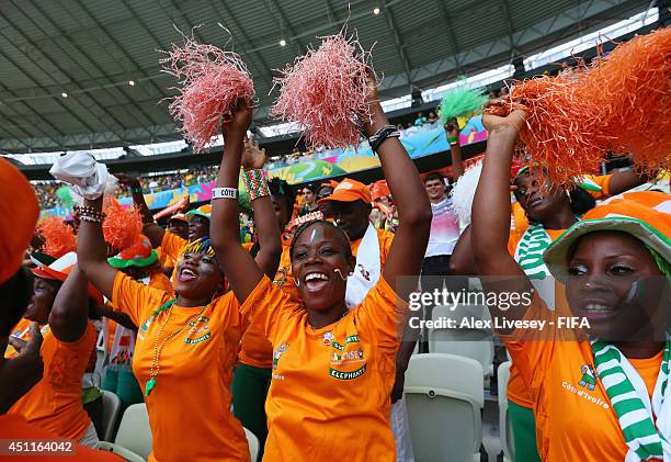 Ivory Coast fans enjoy the atmosphere prior to the 2014 FIFA World Cup Brazil Group C match between Greece and Cote D'Ivoire at Estadio Castelao on...