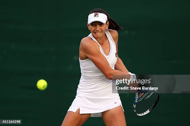 Chanelle Scheepers of South Africa in action during her Ladies' Singles first round match against Christina McHale of the United States on day two of...