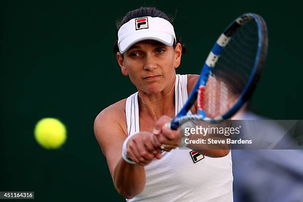 Chanelle Scheepers of South Africa in action during her Ladies' Singles first round match against Christina McHale of the United States on day two of...