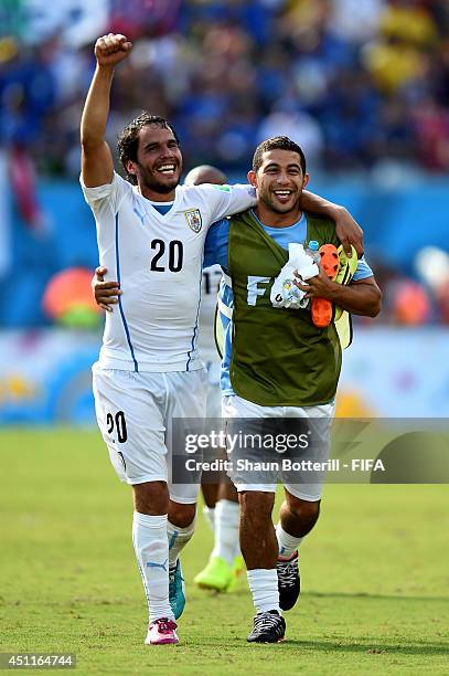 Alvaro Gonzalez and Walter Gargano of Uruguay celebrate the 1-0 win after the 2014 FIFA World Cup Brazil Group D match between Italy and Uruguay at...