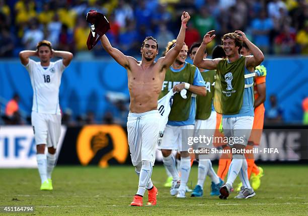 Martin Caceres and Uruguay players celebrate the 1-0 win after the 2014 FIFA World Cup Brazil Group D match between Italy and Uruguay at Estadio das...