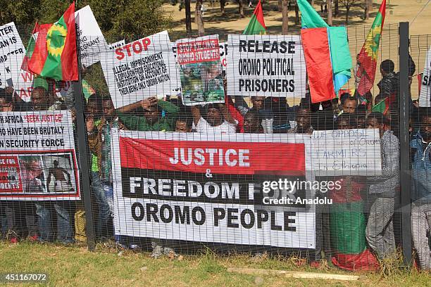 Members of the Oromo community in Pretoria, South Africa take part in a demonstration against Ethiopian government on June 24, 2014. About two...