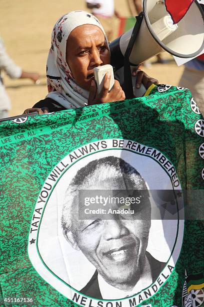 Members of the Oromo community in Pretoria, South Africa take part in a demonstration against Ethiopian government on June 24, 2014. About two...