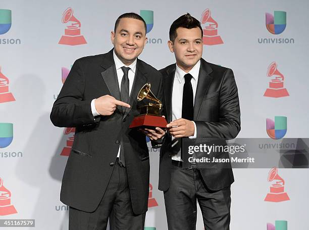 Musicians Felipe Pelaez and Manuel Julian, winners of Best Cumbia/Vallenato Album for "Diferente," pose in the press room at the 14th Annual Latin...