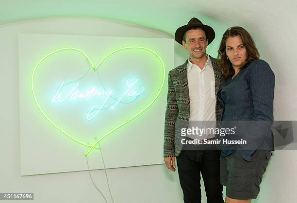 Tracey Enim and Hamish Jenkinson pose at a Private View for 'Illuminating The Future', an online auction with Christie's and £10 e-raffle of a Tracey...