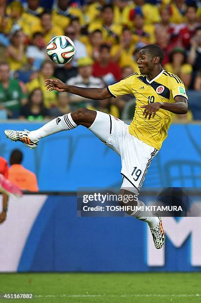 Colombia's forward Adrian Ramos controls the ball during the Group C football match between Japan and Colombia at the Pantanal Arena in Cuiaba during...