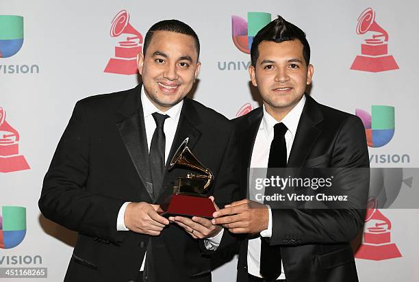 Musicians Felipe Pelaez and Manuel Julian, winners of Best Cumbia/Vallenato Album for 'Diferente,' pose in the press room during The 14th Annual...