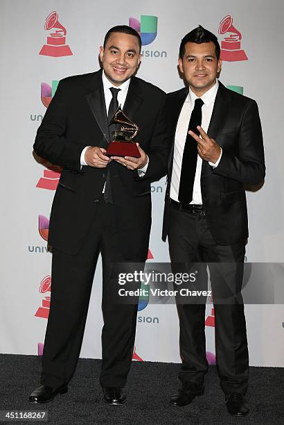 Musicians Felipe Pelaez and Manuel Julian, winners of Best Cumbia/Vallenato Album for 'Diferente,' pose in the press room during The 14th Annual...