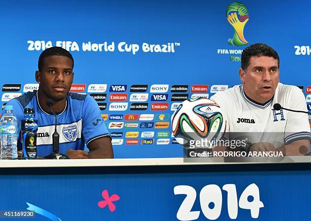Honduras' Colombian coach Luis Suarez and Honduras' defender Juan Carlos Garcia attend a press conference at the Amazonia Arena stadium in Manaus on...