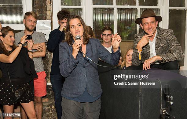 Tracey Enim gives a speech as Hamish Jenkinson looks on t a Private View for 'Illuminating The Future', an online auction with Christie's and £10...