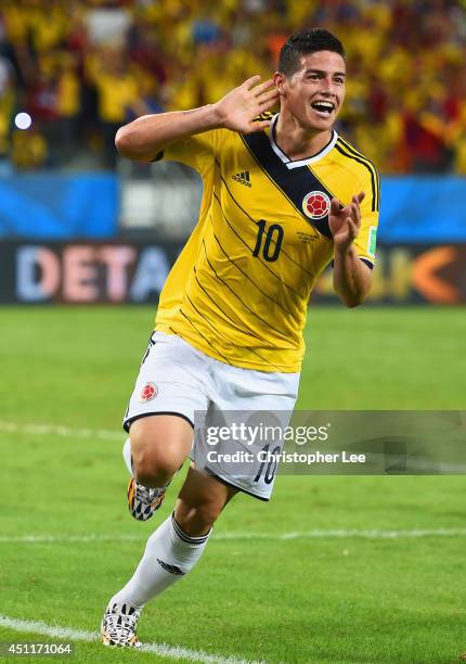 James Rodriguez of Colombia celebrates scoring his team's fourth goal during the 2014 FIFA World Cup Brazil Group C match between Japan and Colombia...