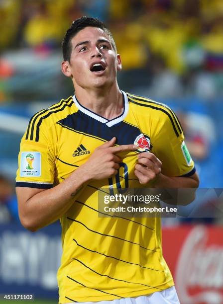 James Rodriguez of Colombia celebrates scoring his team's fourth goal during the 2014 FIFA World Cup Brazil Group C match between Japan and Colombia...