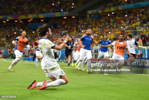 Giorgos Samaras of Greece celebrates scoring his team's second goal on a penalty kick during the 2014 FIFA World Cup Brazil Group C match between...
