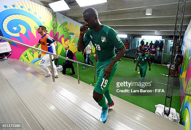 Yaya Toure of the Ivory Coast walks in the tunnel to the dressing room after the first half in the 2014 FIFA World Cup Brazil Group C match between...