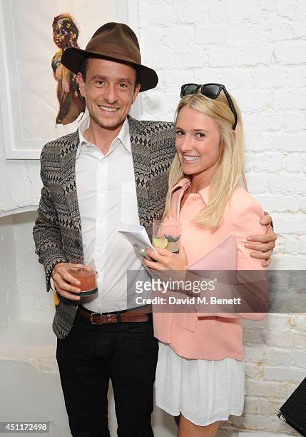 Hamish Jenkinson and Scarlett Bowman attend a private view of "Illuminating The Future: In Aid Of The Old Vic", a Christie's online auction...
