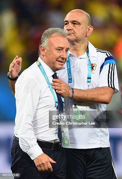 Head coach Alberto Zaccheroni and assistant coach Eugenio Albarella react after the 2014 FIFA World Cup Brazil Group C match between Japan and...