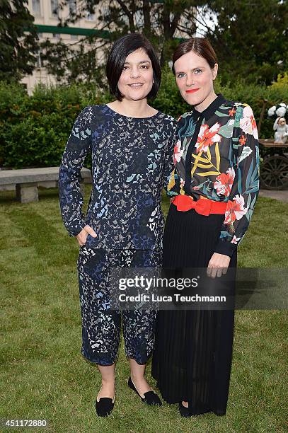 Jasmin Tabatabai and Fritzi Haberlandt attends the Secret Garden Party hosted by Edited at Schinkel Pavillon on June 24, 2014 in Berlin, Germany.