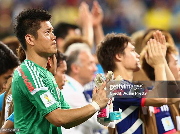 Goalkeeper Eiji Kawashima of Japan and his teammates acknowledge the fans after the 2014 FIFA World Cup Brazil Group C match between Japan and...
