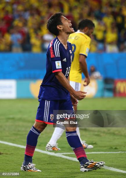 Shinji Kagawa of Japan reacts during the 2014 FIFA World Cup Brazil Group C match between Japan and Colombia at Arena Pantanal on June 24, 2014 in...