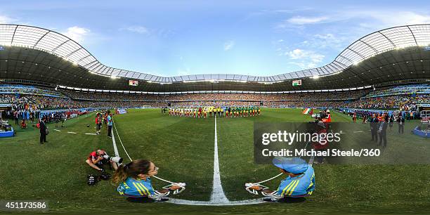 The teams line up before the 2014 FIFA World Cup Brazil Group C match between Greece v Cote D'Ivoire at Castelao on June 24, 2014 in Fortaleza,...