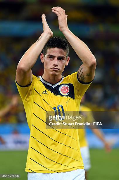 James Rodriguez of Colombia celebrates after the 2014 FIFA World Cup Brazil Group C match between Japan and Colombia at Arena Pantanal on June 24,...