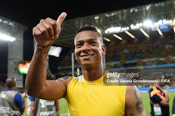 Fredy Guarin of Colombia celebrate the 4-1 win as he walks off the pitch after the 2014 FIFA World Cup Brazil Group C match between Japan and...