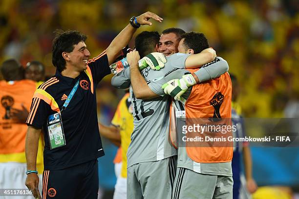 Players of Colombia congratualte Faryd Mondragon of Colombia after the 2014 FIFA World Cup Brazil Group C match between Japan and Colombia at Arena...