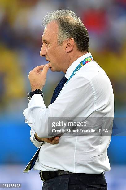 Head coach Alberto Zaccheroni of Japan looks on during the 2014 FIFA World Cup Brazil Group C match between Japan and Colombia at Arena Pantanal on...