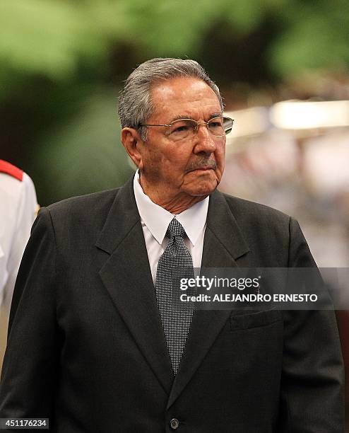 Cuban President Raul Castro is seen during the welcoming ceremony of St Kitts and Nevis Prime Minister Denzil Douglas on June 24, 2014 in Havana. AFP...