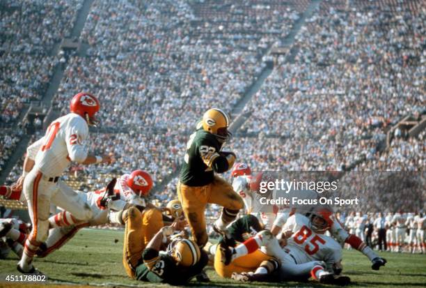 January 15: Elijah Pitts of the Green Bay Packers carries the ball against the Kansas City Chiefs during Super Bowl I January 15, 1967 at the Los...