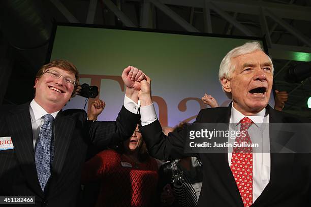 Sen. Thad Cochran and Mississippi Lieutenant Governor Tate Reeves celebrate during Cochran's "Victory Party" after holding on to his seat after a...