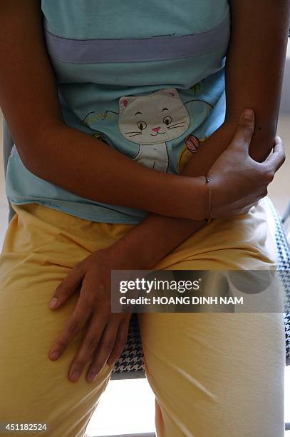 To go with AFP story Vietnam-China-women-trafficking-social,FEATURE by CAT BARTON This picture taken on May 9, 2014 shows H'mong ethnic girl Kiab...