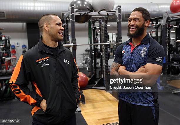 Fighter James Te Huna and Manu Vatuvei of the Warriors speak in the Warriors gym before a New Zealand Warriors NRL training session at Mt Smart...