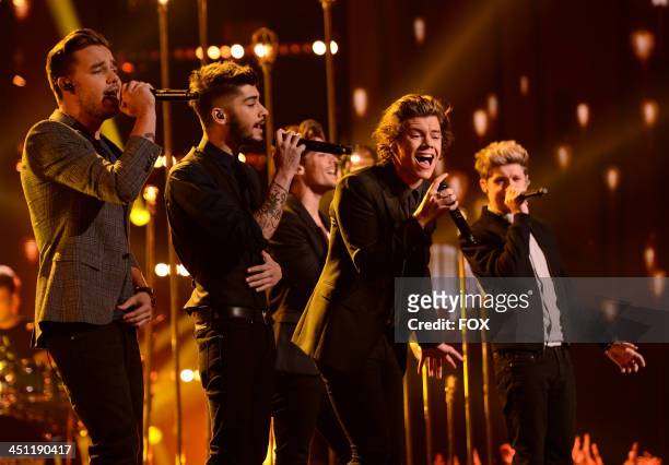 Liam Payne, Zayn Malik, Harry Styles, Louis Tomlinson and Niall Horan of 'One Direction' performs on FOX's "The X Factor" Season 3 Top 10 To 9 Live...