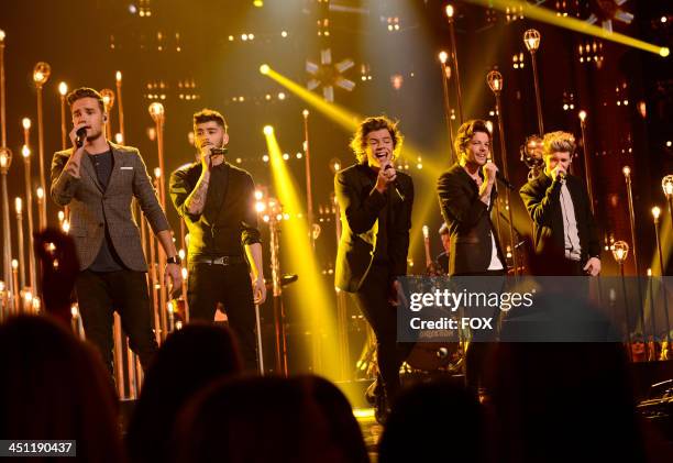 Liam Payne, Zayn Malik, Harry Styles, Louis Tomlinson and Niall Horan of 'One Direction' performs on FOX's "The X Factor" Season 3 Top 10 To 9 Live...