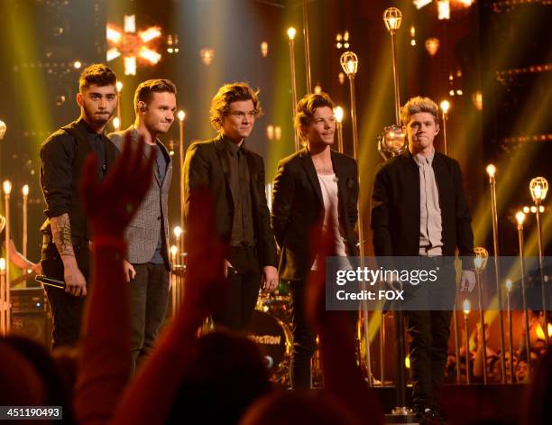 Zayn Malik, Liam Payne, Harry Styles, Louis Tomlinson and Niall Horan of 'One Direction' performs on FOX's "The X Factor" Season 3 Top 10 To 9 Live...