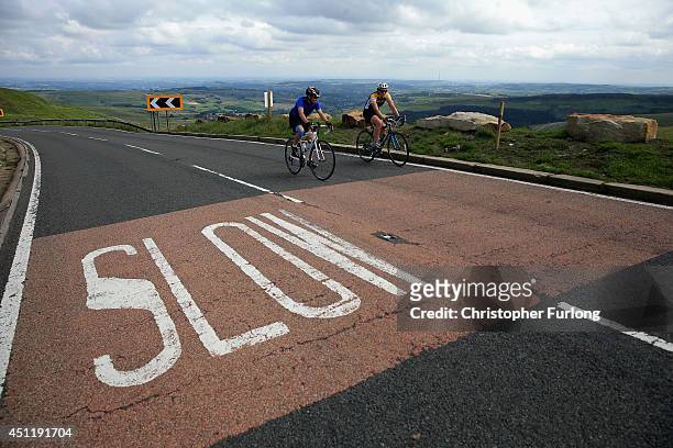 Cycling enthusiasts make their way up the Holme Moss incline, one of the highest points on route 2, as Yorkshire prepares to host the Tour de France...