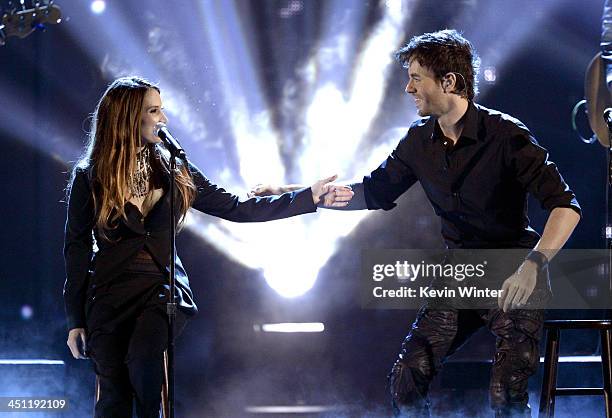 Recording artists Enrique Iglesias and India Martinez perform onstage during The 14th Annual Latin GRAMMY Awards at the Mandalay Bay Events Center on...