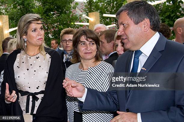 Queen Maxima of The Netherlands and Mrs Lilianne Ploumen Dutch Minister for Trade and Development Cooperation and Polish Deputy Prime Minister Janusz...