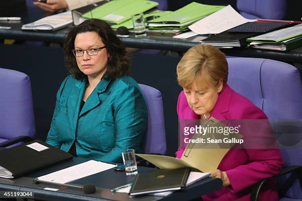 German Chancellor Angela Merkel , who is also Chairwoman of the German Christian Democrats , and Minister of Work and Social Issues Andrea Nahles of...