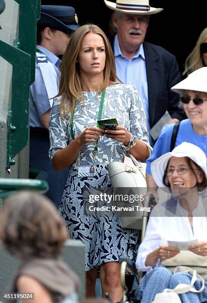 Kim Sears attends the Andy Murray v Blaz Rola match on court one during day three of the Wimbledon Championships at Wimbledon on June 25, 2014 in...
