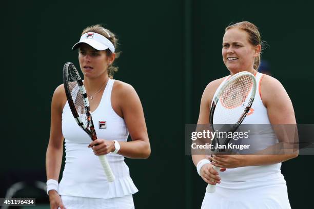 Julia Goerges and Anna-Lena Groenefeld of Germany during their Ladies Doubles first round match against Vesna Dolonc of Serbia and Daniela Seguel of...