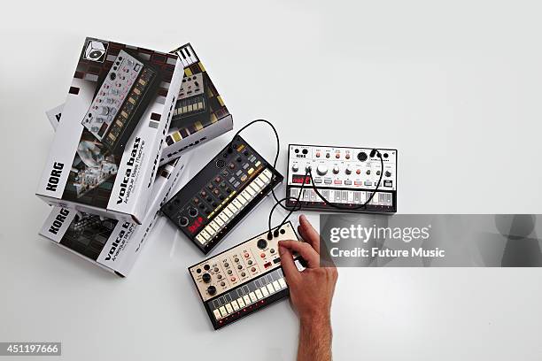 Selection of Korg Volca Series true-analog synthesizers photographed on a white background, taken on August 8, 2013.