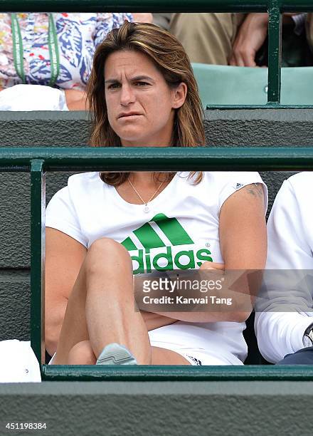 Amelie Mauresmo attends the Andy Murray v Blaz Rola match on court one during day three of the Wimbledon Championships at Wimbledon on June 25, 2014...