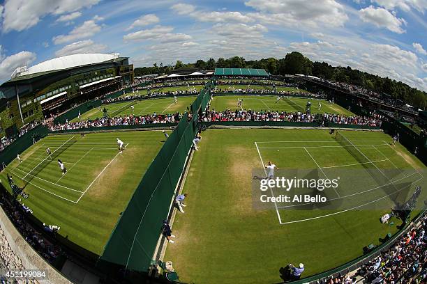 An aerial General view of the play on the outside courts on day three of the Wimbledon Lawn Tennis Championships at the All England Lawn Tennis and...