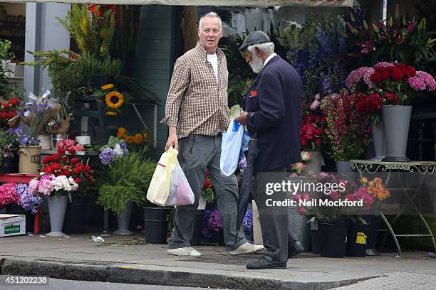 Michael Barrymore is seen visiting various chemists in Notting Hill. During his trip to West London, he also window shopped at Oxfam before catching...