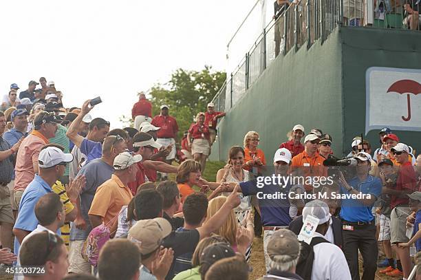 Travelers Championship: Kevin Streelman victorious, with his wife Courtney, holding their 6-month-old daughter Sophia, after winning tournament on...