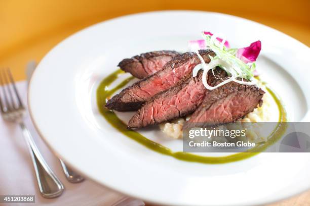 The Pineland Farm hanger steak with leek and garlic cous cous, fresh bean salad, yogurt dressing and mint vinaigrette at the restaurant 51 Lincoln.