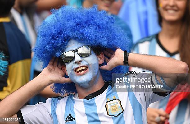 An Argentina's fan poses before the Group F football match between Nigeria and Argentina at the Beira-Rio Stadium in Porto Alegre during the 2014...