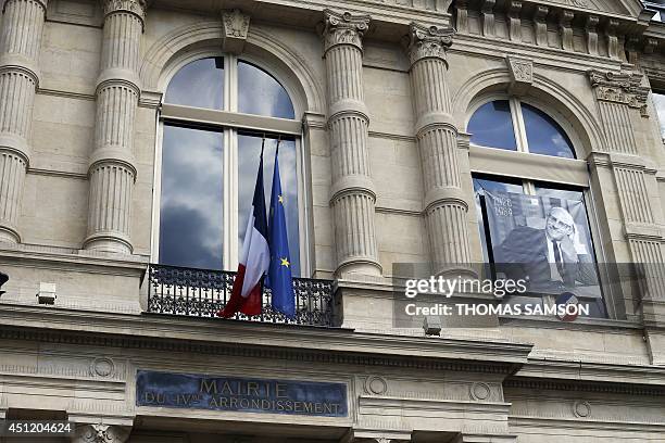 Picture of French philosopher Michel Foucault is seen on the city hall of the fourth Parisian district to mark the 30th anniversary of his death on...